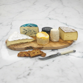 Mixed French Cheese Board on White Marble