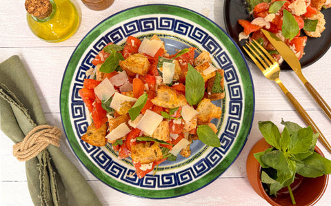 Tomato panzanella with Manchego shavings and fresh basil