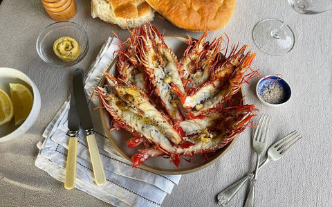 Grilled tiger prawns with seaweed butter and lemon