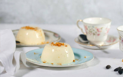 Creamy homemade tonka bean panna cotta in individual dessert moulds