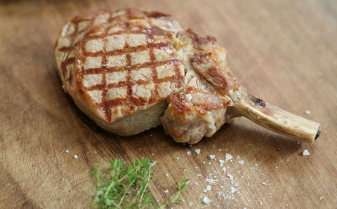 Seared Dutch milk-fed veal cutlet served with wilted spinach, porcini mushrooms and port jus.