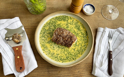 Spring truffle scalloped hake with silky beurre blanc and fresh chives