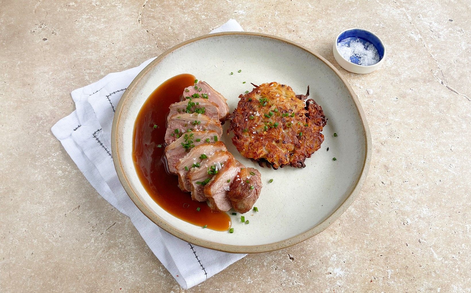 Lamb Cannon with Spiced Potato Cake and White Wine Sauce