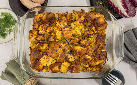 Bronzed brioche stuffing in a glass tray