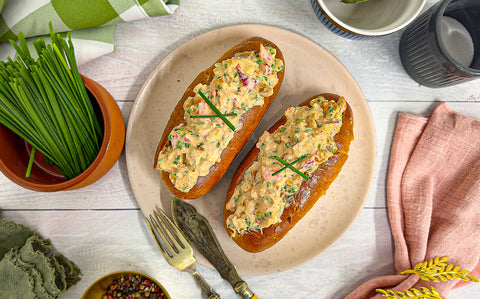 Pink lobster meat in a spiced creamy dressing, piled inside brioche rolls