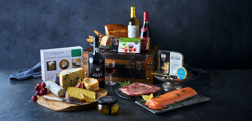 An overspilling Christmas hamper full of seasonal ingredients