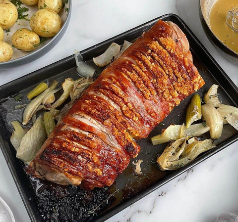 Suckling Pig Rack with Roasted Vegetable Gravy