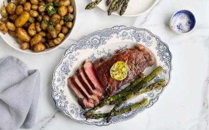 New York Strip Loin with Jersey Royals, Asparagus and Maitre d’Hotel Butter 